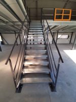 warehouse landing, stairs to the first floor